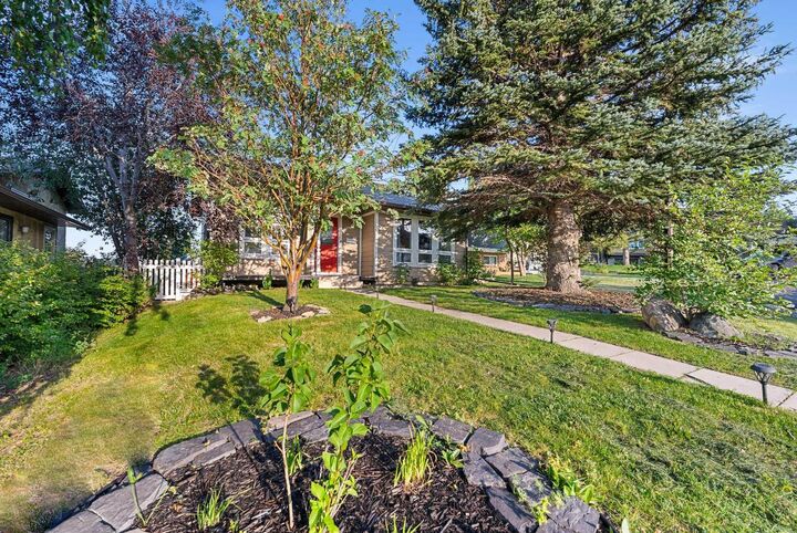 Property Photo: 51 Bearberry Bay NW AB T3K 1R6