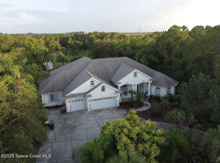 Property Photo: 1857 Timbers West Boulevard FL 32955