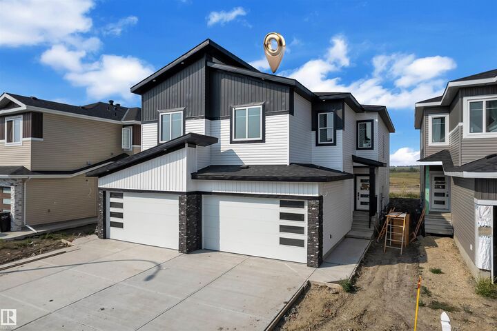 Property Photo: 1914 155 Avenue NW AB T5Y 4H8