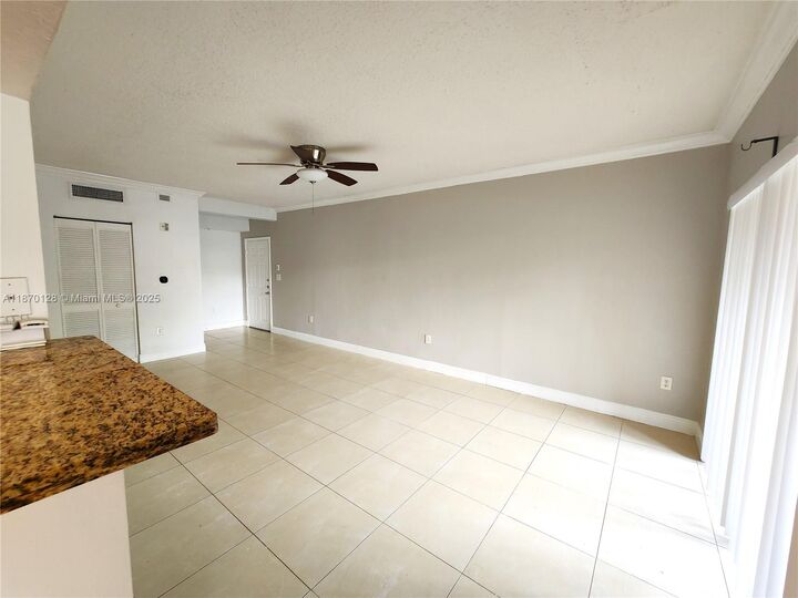Property Photo:  11600 SW 2nd St 18101  FL 33025 