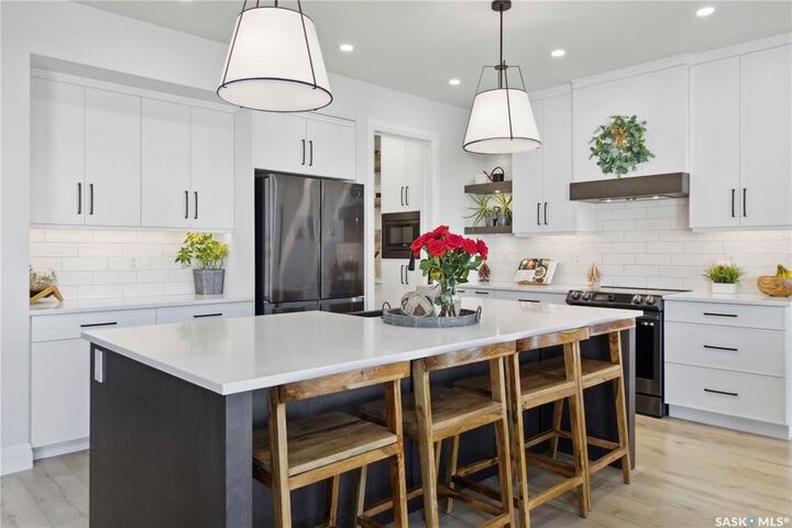 Property Photo:  416 Woolf Bend  SK S7W 1E5 