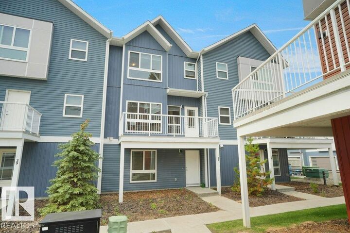 Property Photo: 979 Crystallina Nera Way NW 38 AB T5Z 0S3