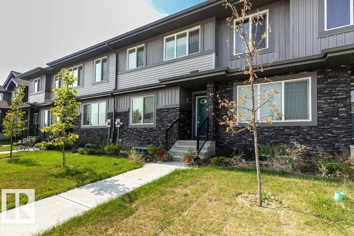 Property Photo:  1537 Sandstone Boulevard  AB T8H 1Z8 