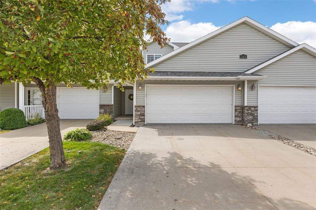 Property Photo: 305 Windflower Ln B IA 52333