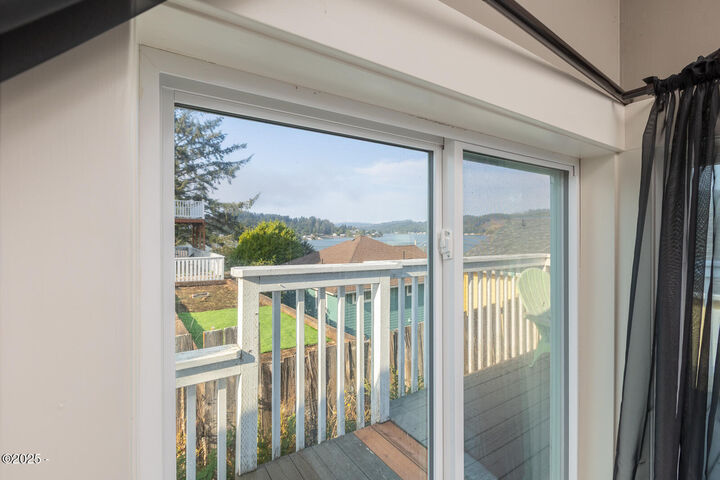 Property Photo:  210 SE Surf Ave  OR 97367 