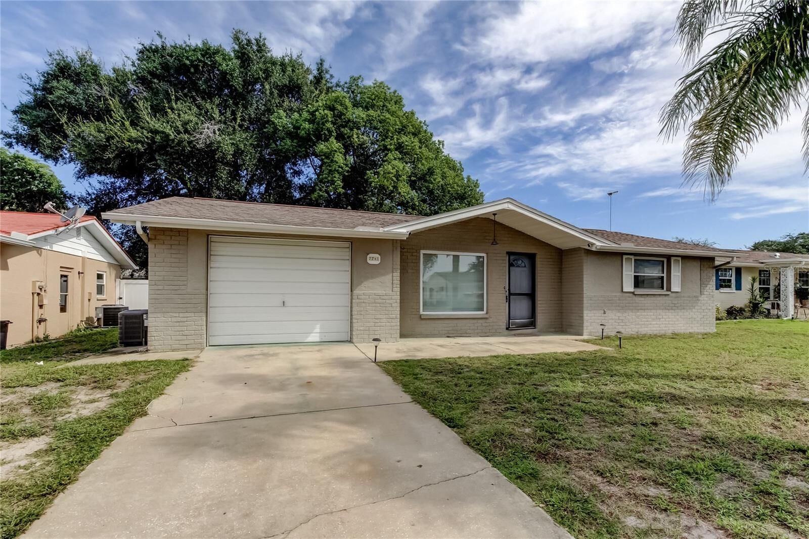 Property Photo: 7741 Hawthorn Drive FL 34668