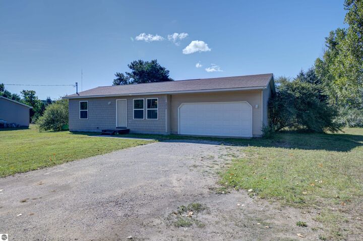 Property Photo:  5975 Barney Road  MI 49684-9608 