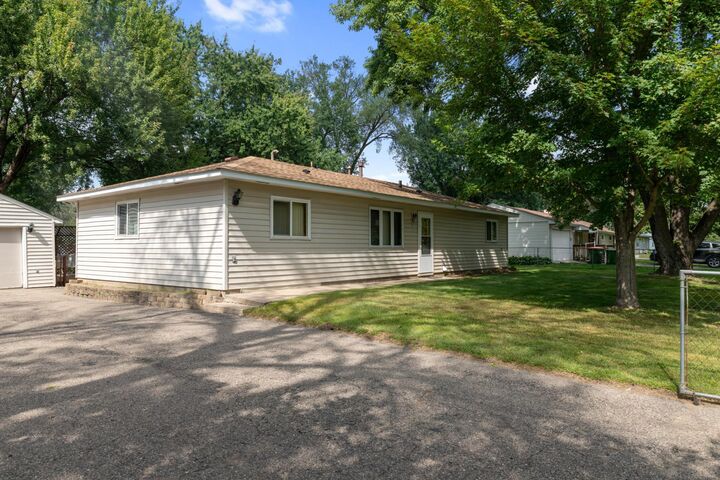 Property Photo:  9910 Norway Street NW  MN 55433 