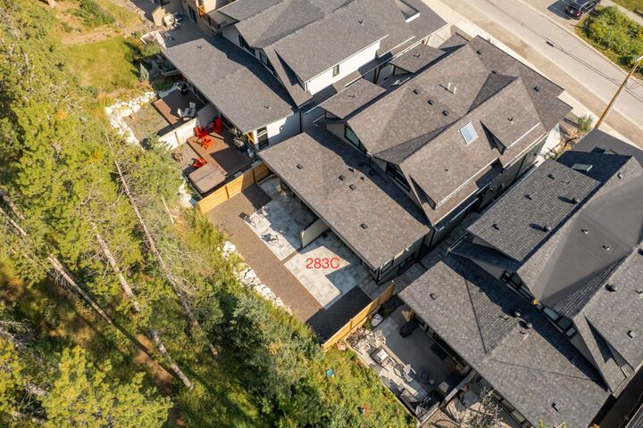 Property Photo:  283C Three Sisters Drive  AB T1W 2M5 