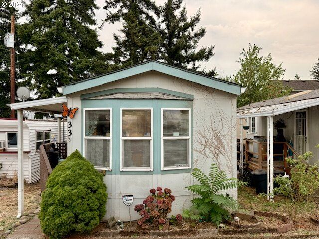 Property Photo:  7911 SE 82nd Ave 33  OR 97266 
