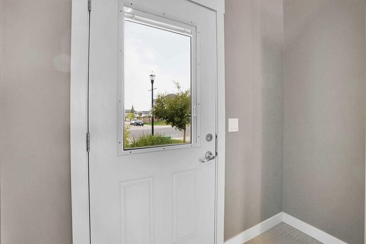 Property Photo: 157 Rainbow Falls Boulevard AB T1X 0N6