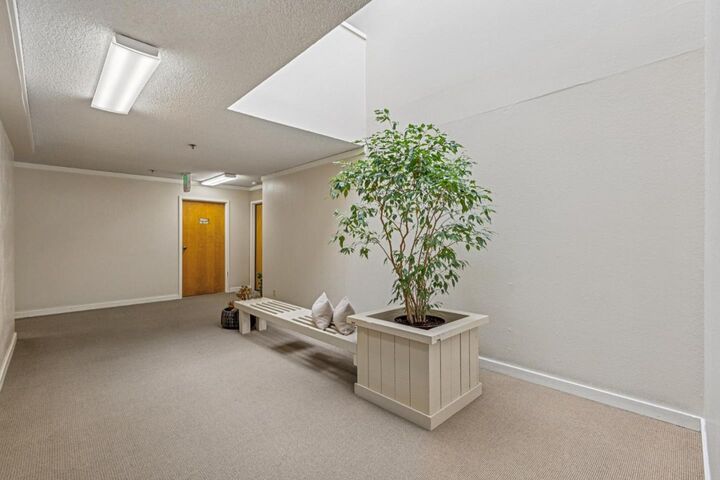 Property Photo:  1115 Continentals Way 203  CA 94002 