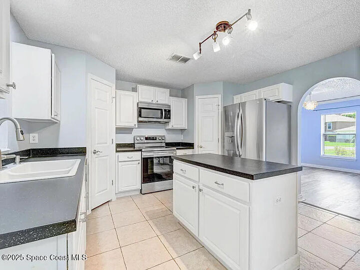 Property Photo:  2240 Spring Creek Circle NE  FL 32905