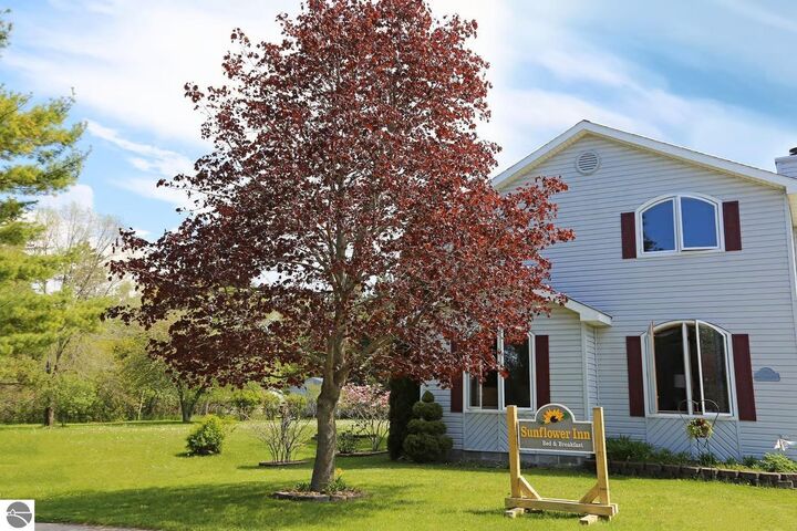 Property Photo:  206 W Carpenter Street  MI 49720 