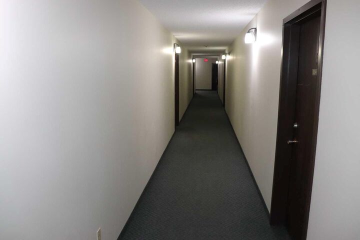 Property Photo:  1221B West Haven Drive 205  AB T7E 1P9 