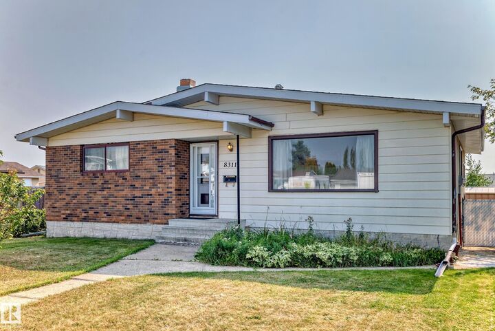 Property Photo:  8311 150 Avenue NW  AB T5E 1B9 