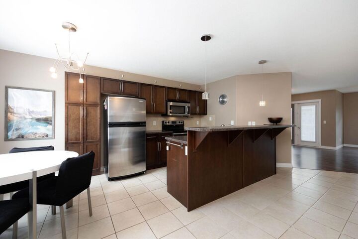 Property Photo:  180 Riverstone Ridge 33  AB T9K 0V6 