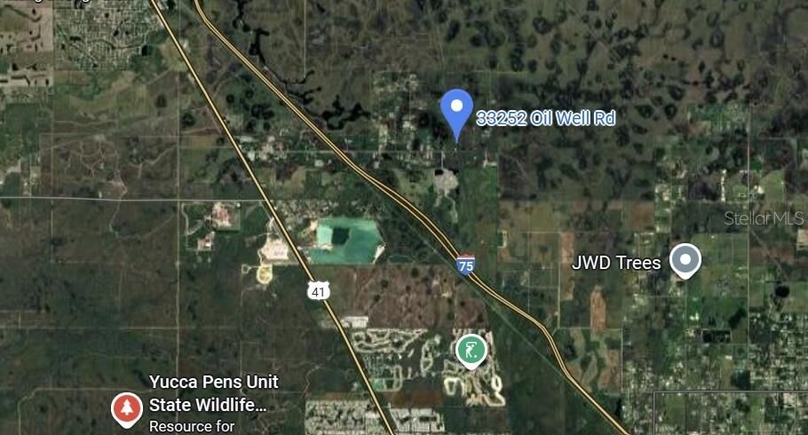 Property Photo:  33252 Oil Well Road  FL 33955 
