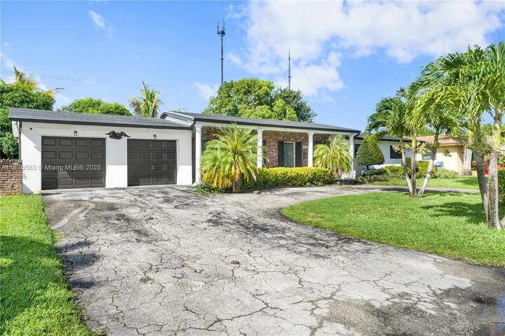 Property Photo:  801 NW 203rd St  FL 33169 