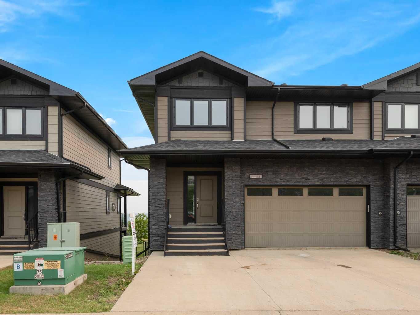 Property Photo:  208 Sparrow Hawk Drive 13  AB T9K 0Y8 