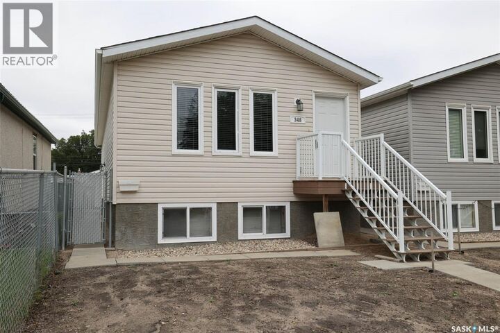Property Photo:  348 Robinson Street  SK S4R 3R2 