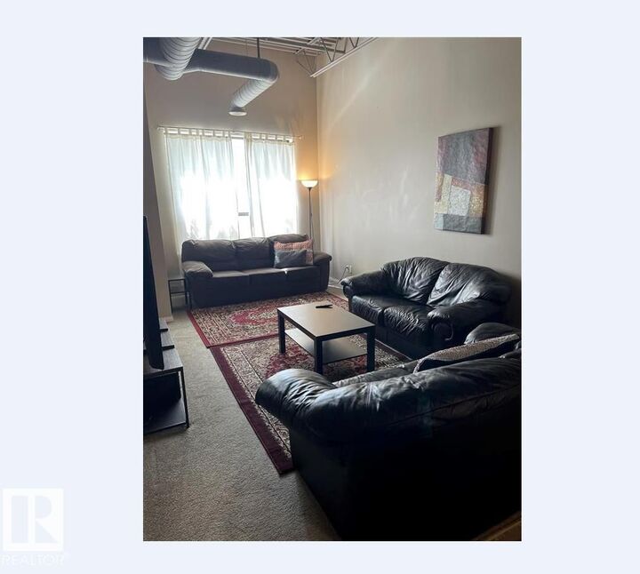 Property Photo: 9817 103 Street 211 AB T8L 2C7