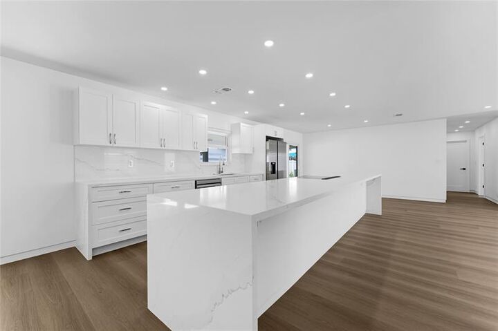 Property Photo:  699 NE 70th St  FL 33487 