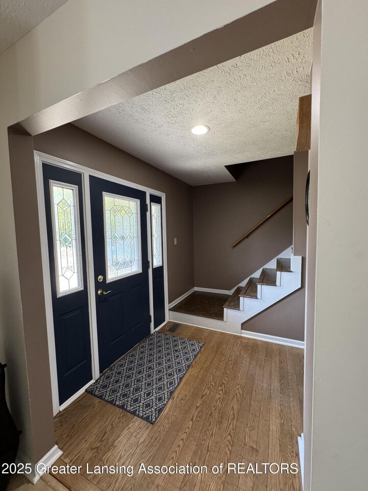 Property Photo: 3990 Camperdown Drive MI 48911