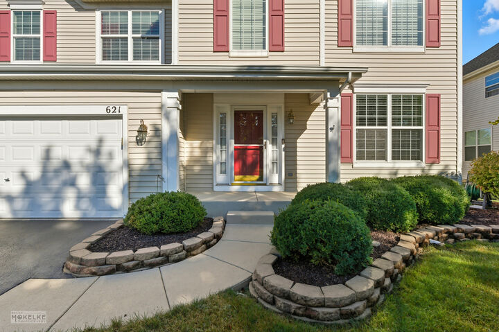 Property Photo: 621 Mansfield Way IL 60543