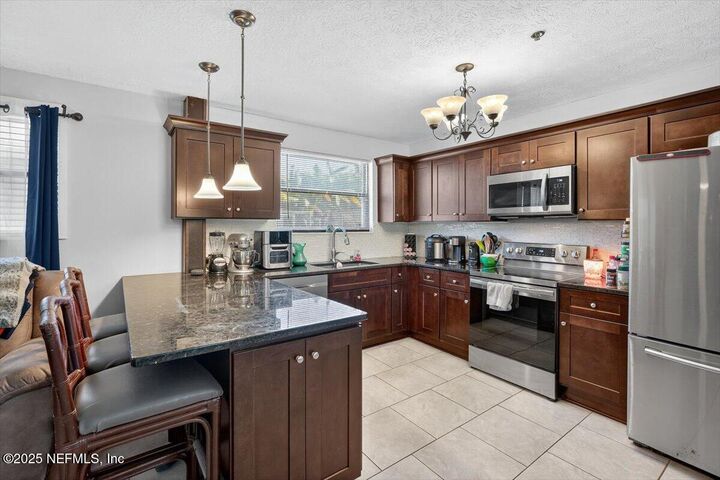 Property Photo:  7959 Lancia Street N  FL 32244 