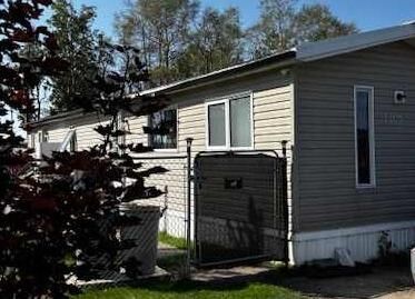 Property Photo:  103 Meadow Drive  AB T0M 0H0 