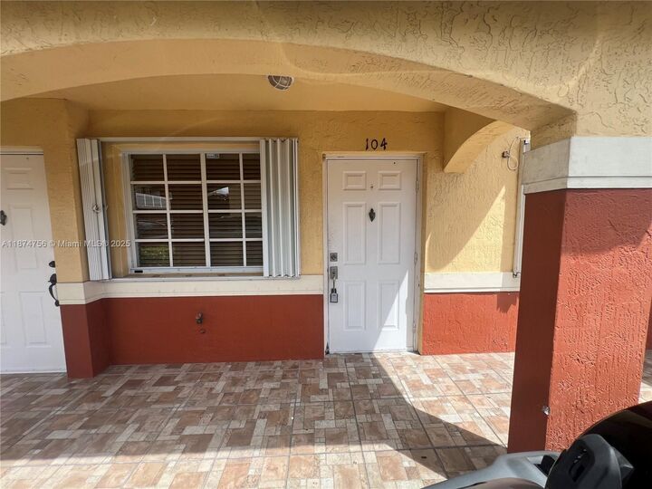 Property Photo:  7411 W 22nd Ave 104  FL 33016 