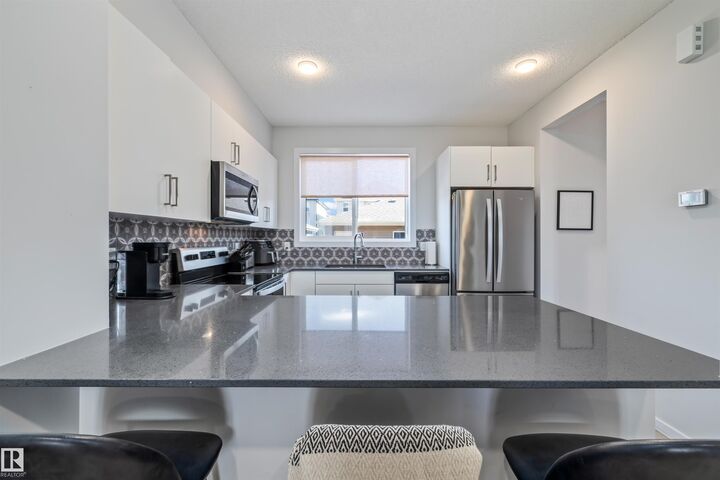 Property Photo:  2097 Maple Road NW  AB T6J 1J2 