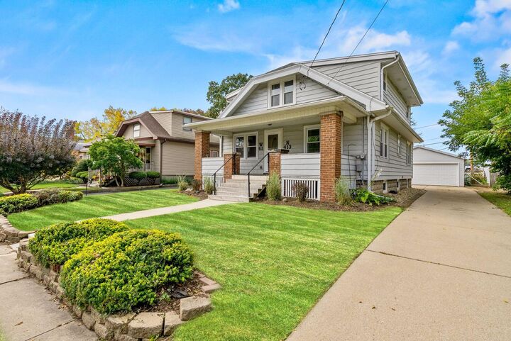 Property Photo:  W61n413 Washington Ave  WI 53012 