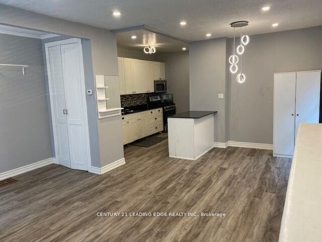 Property Photo:  1323 Woodbine Avenue Main  ON M4C 4E9 
