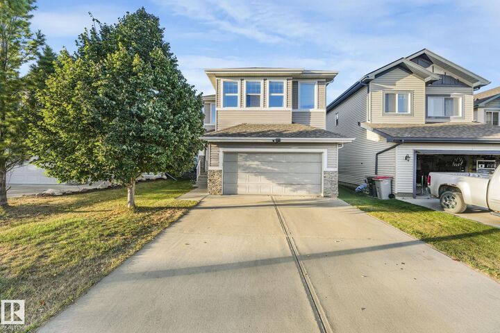 Property Photo:  209 Silverstone Crescent  AB T7Z 0E8 