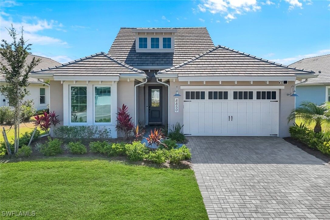 Property Photo:  8850 Calypso Court  FL 34112 