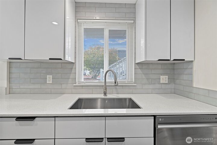 Property Photo:  8823  Holly Drive F103  WA 98208 