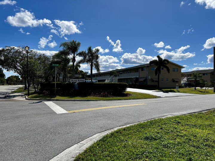 Property Photo:  2222 NE 1st Way 103  FL 33435 