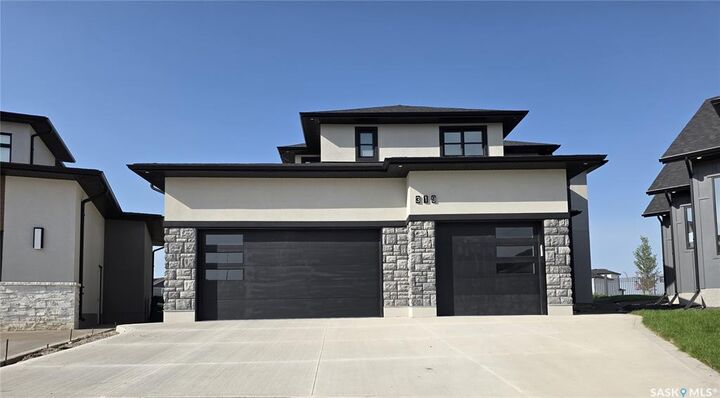 Property Photo: 319 Woolf Bay SK S7W 1E5