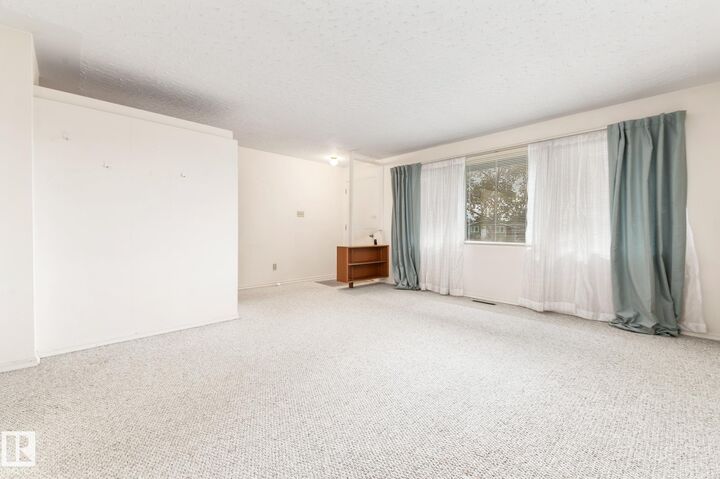 Property Photo:  12419 135A Avenue NW  AB T5L 3Z4 