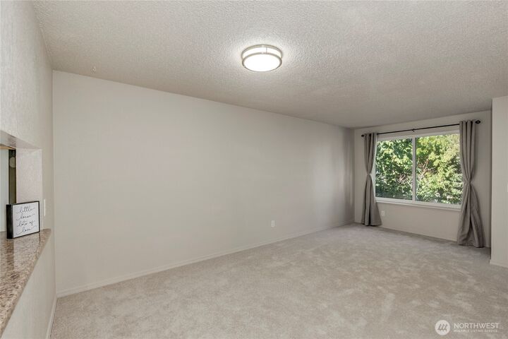 Property Photo: 8911 Holly Drive 207 WA 98208