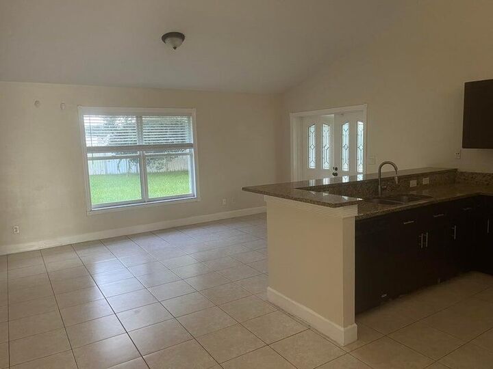Property Photo:  702 SW Amber Terrace  FL 34953