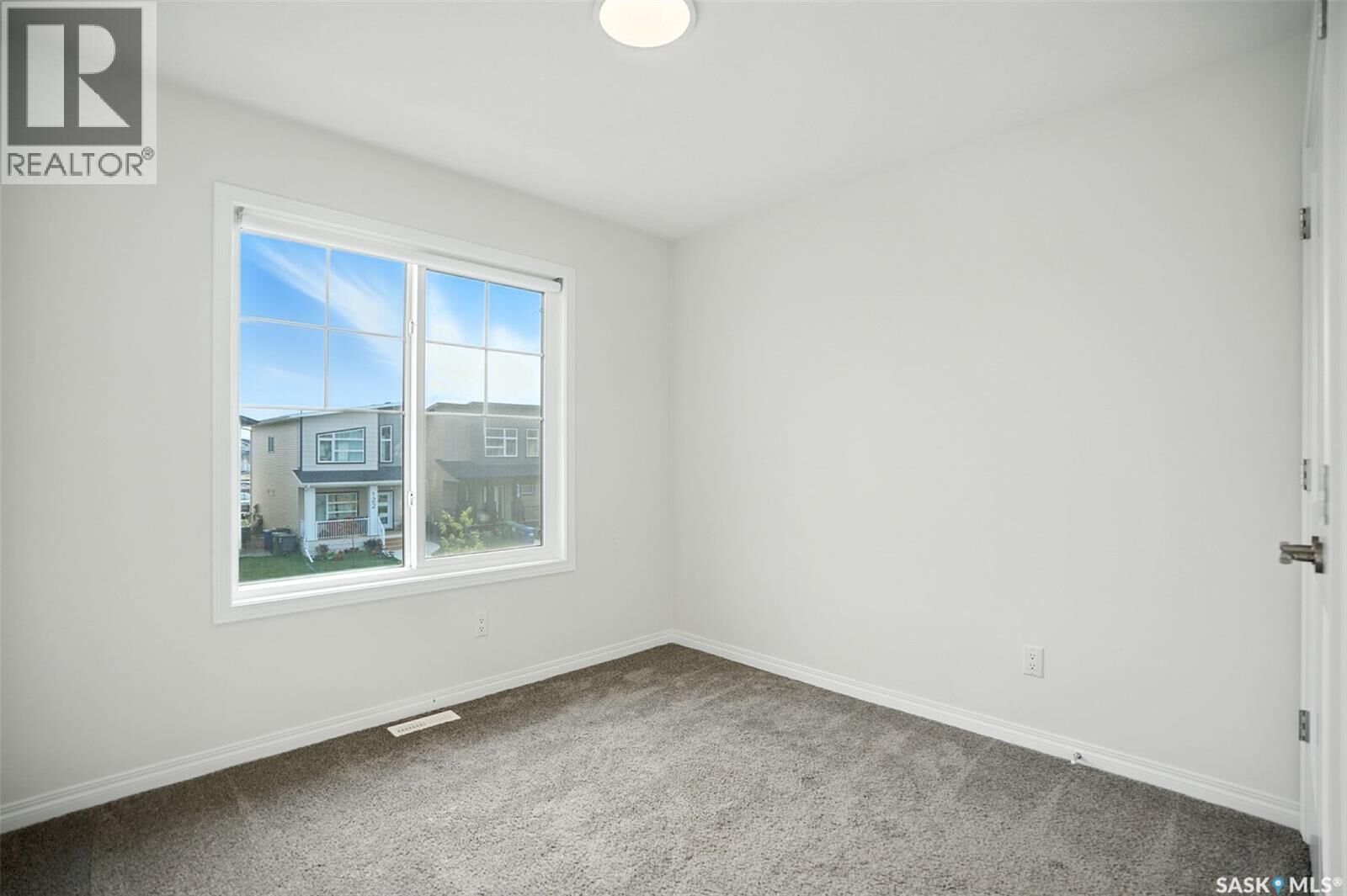 Property Photo: 127 Taube Avenue SK S7V 0W1