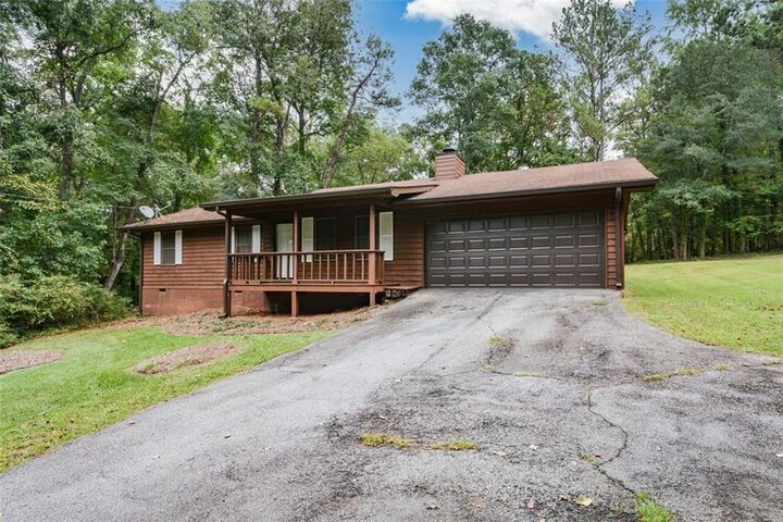 Property Photo:  4800 Timber Ridge Drive  GA 30135 