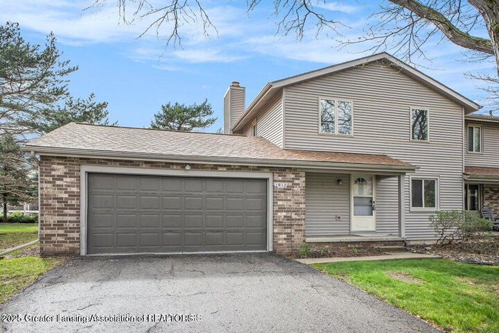 Property Photo:  1012 Grenoble Circle  MI 48917 