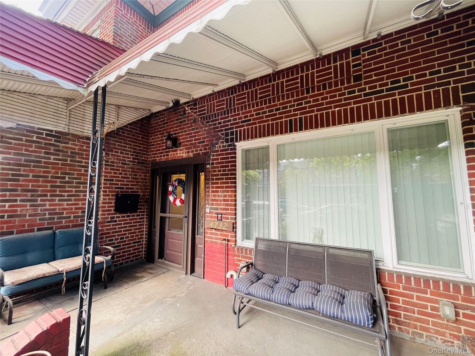Property Photo:  47-32 39th Street  NY 11104 
