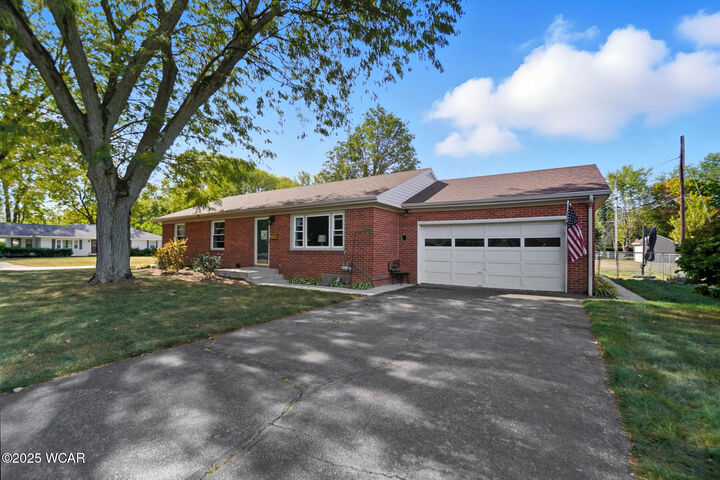 Property Photo:  210 Eastown Park Row  OH 45840 