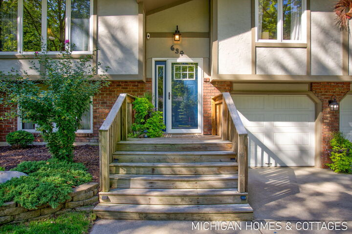 Property Photo:  634 Blackbass Avenue  MI 49423 