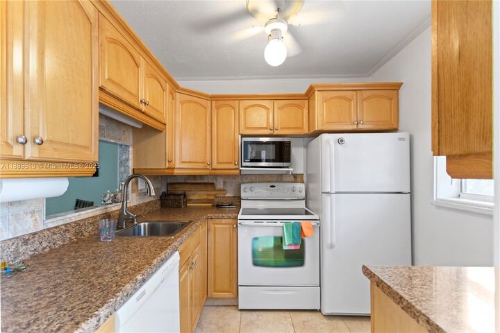 Property Photo:  4701 NW 34th St 511  FL 33319 